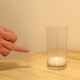 Illustration for article titled Astounding: 7 Incredible Photos Of Hands Pointing To Glasses Of Milk With Their Ring Fingers